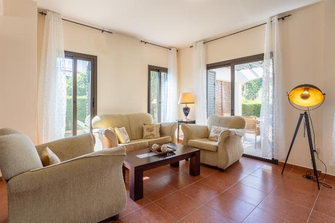 Living room with sofas, dining area, WiFi internet, and satellite TV . - Villa Iliana . (Galerie de photos) }}