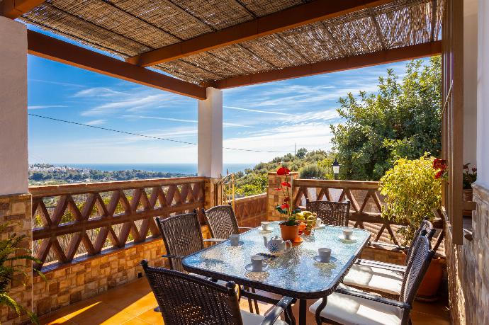 Sheltered terrace area with sea views . - Villa Ana y Garcia . (Photo Gallery) }}