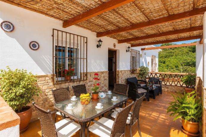Sheltered terrace area . - Villa Ana y Garcia . (Photo Gallery) }}