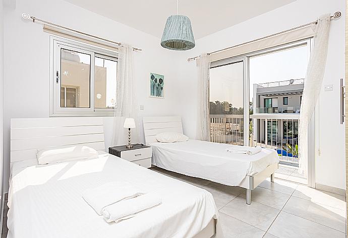 Twin bedroom with A/C . - Villa Marina . (Photo Gallery) }}