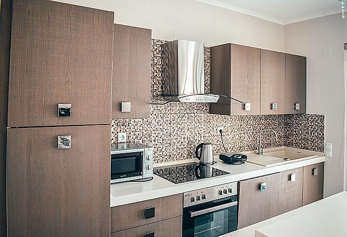 Equipped kitchen . - Villa Argo . (Photo Gallery) }}