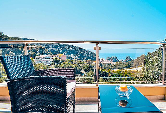 Upper terrace area with sea views . - Villa Argo . (Photo Gallery) }}