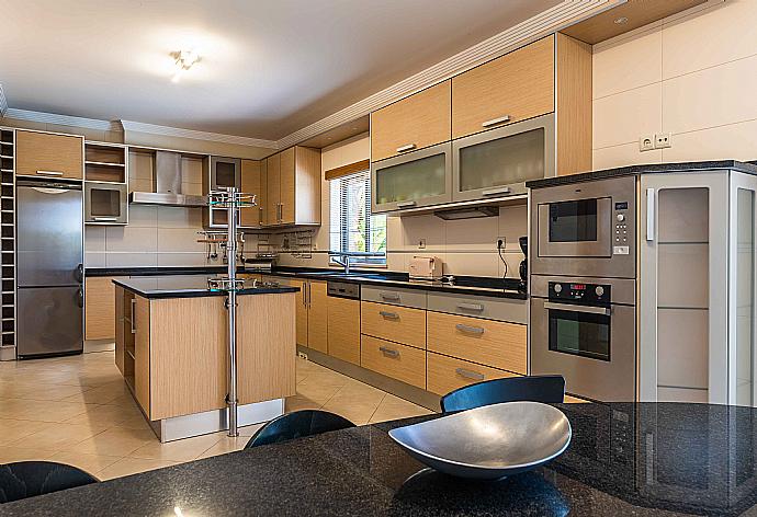 Equipped kitchen . - Villa Hunes . (Photo Gallery) }}