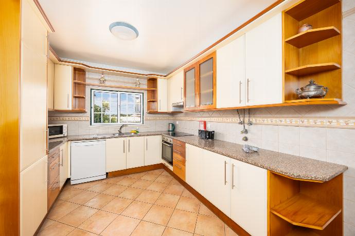Equipped kitchen with dining area . - Villa Santa Maria . (Photo Gallery) }}