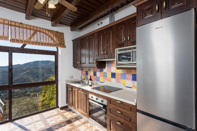 Equipped kitchen . - Villa Cortijo El Amigo . (Fotogalerie) }}