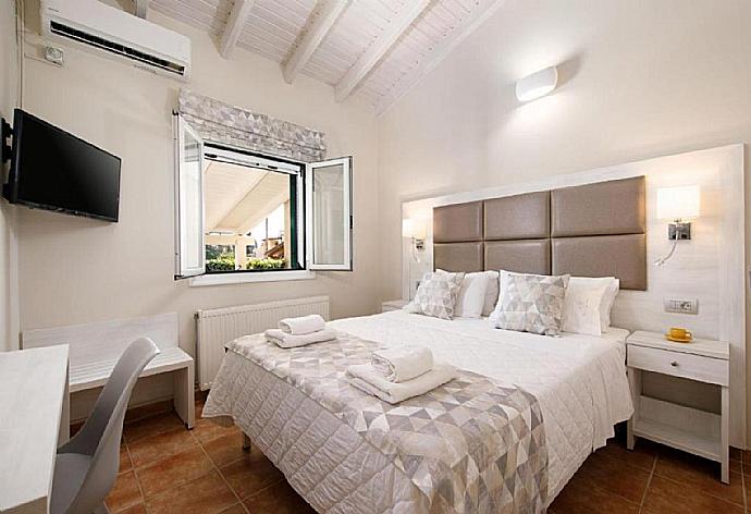 Double bedroom with A/C  . - Villa George . (Photo Gallery) }}