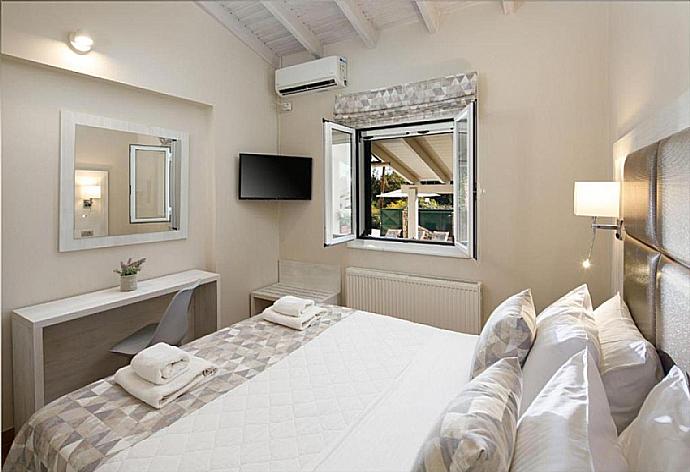Double bedroom with A/C  . - Villa George . (Photo Gallery) }}