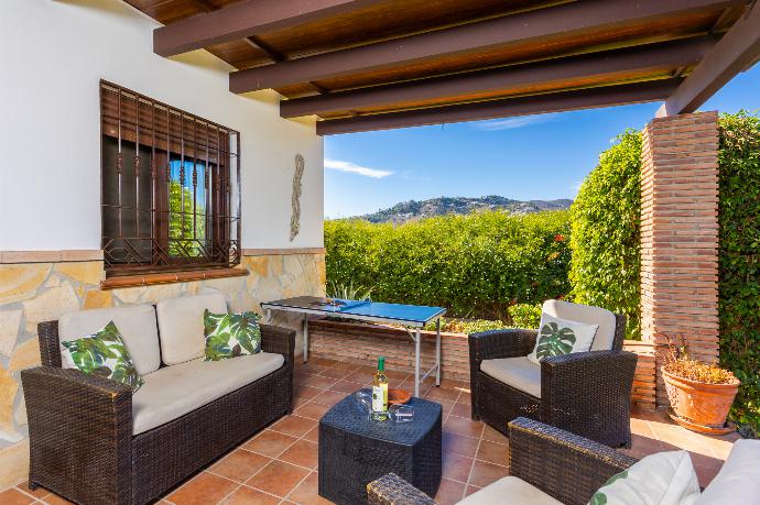 Sheltered terrace area . - Villa Loli Imaroga One . (Photo Gallery) }}