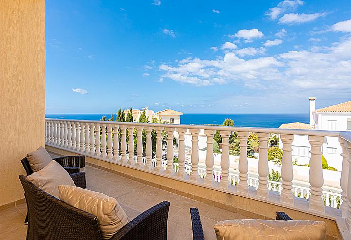 Upper terrace area with sea views . - Villa Amore . (Photo Gallery) }}