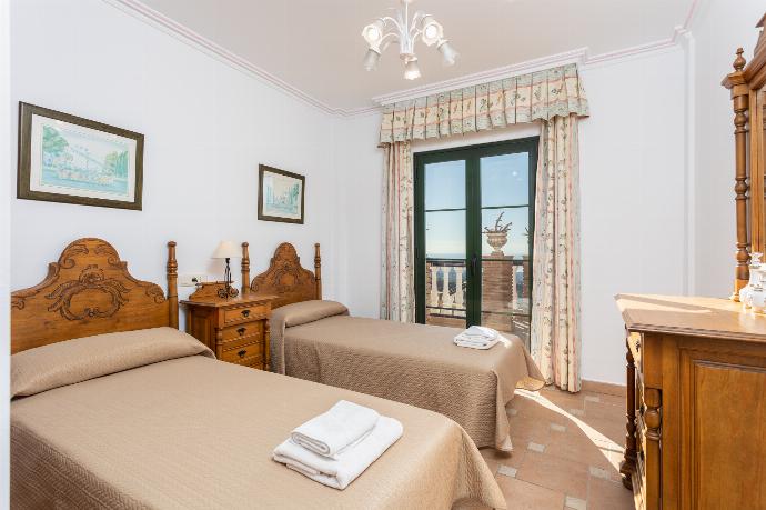 Twin bedroom with A/C, sea views, and balcony access . - Villa El Pedregal . (Galleria fotografica) }}