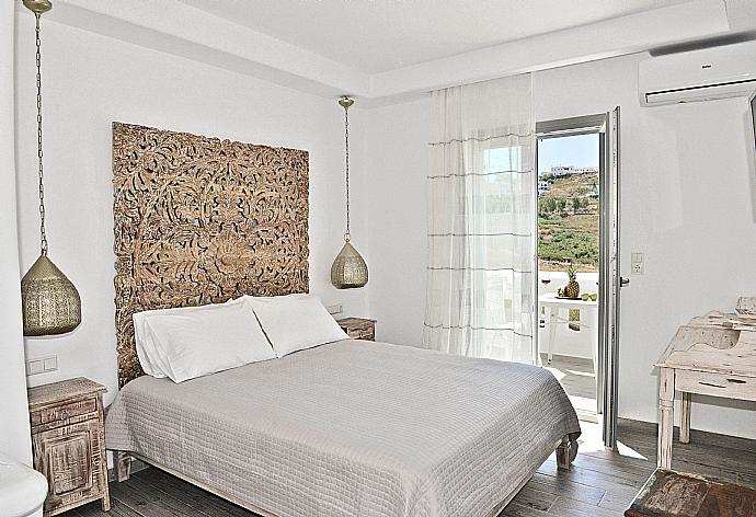 Double bedroom with A/C and TV . - Villa Kalliope . (Photo Gallery) }}