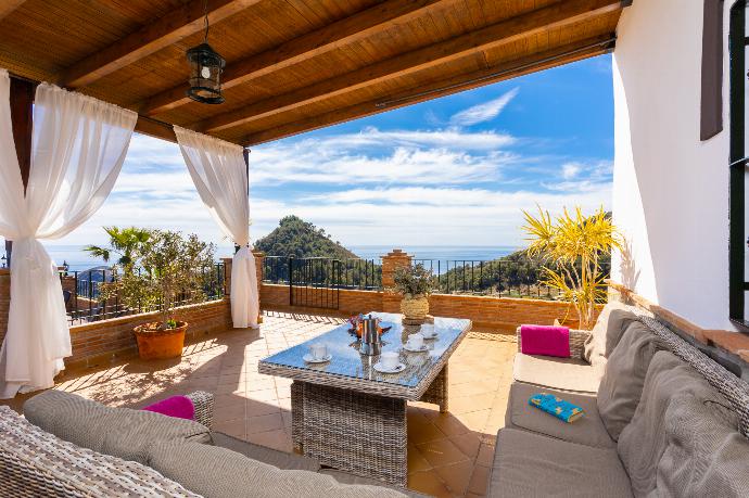 Sheltered terrace area with panoramic sea views . - Villa Flores . (Photo Gallery) }}