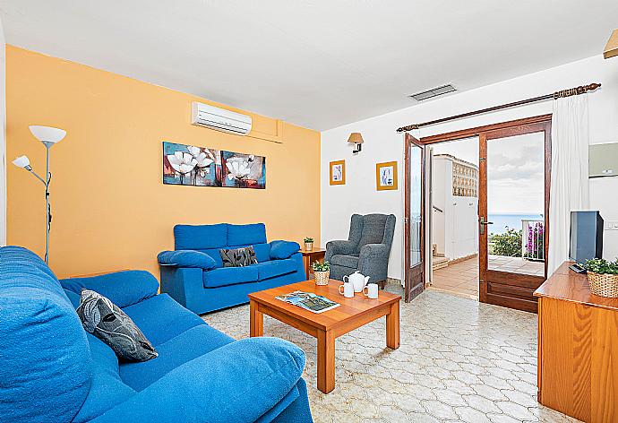 ,Living room area with A/C, and terrace access with a panoramic sea viewsea view . - Villa Castellet . (Galleria fotografica) }}