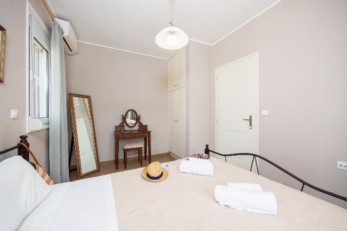 Double bedroom with A/C . - Villa Chloe . (Photo Gallery) }}