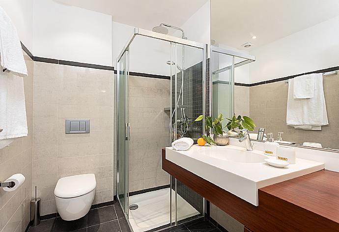 Family bathroom on ground floor with shower . - Annabel Beach Palace . (Photo Gallery) }}