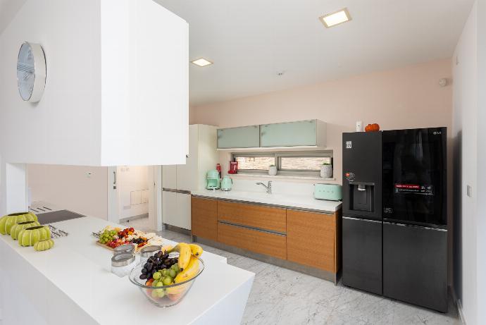 Equipped kitchen . - Annabel Beach Palace . (Galerie de photos) }}