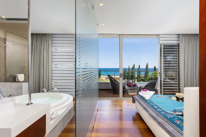 Double bedroom on second floor with en suite bathroom, A/C, sea views, and balcony access . - Annabel Beach Palace . (Galerie de photos) }}