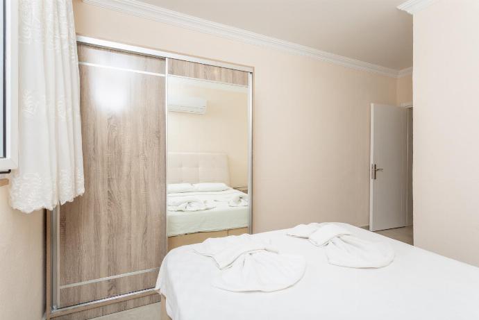 Double bedroom with en suite bathroom and A/C . - Duman Collection . (Photo Gallery) }}