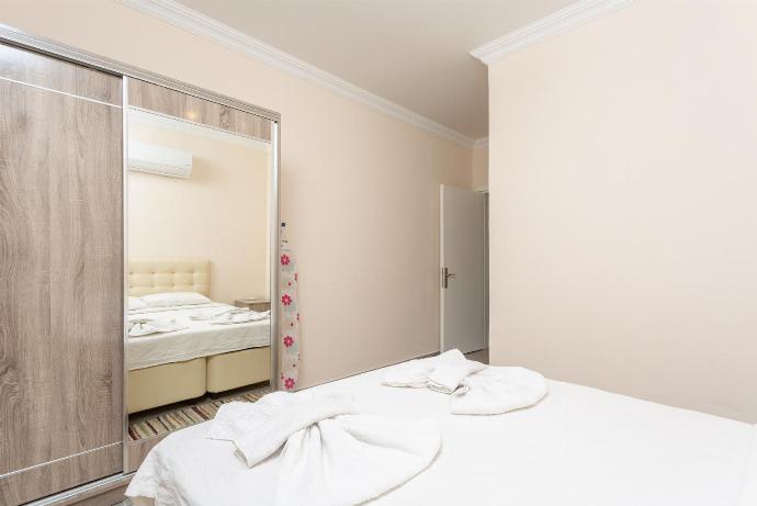 Double bedroom with en suite bathroom and A/C . - Duman Collection . (Галерея фотографий) }}