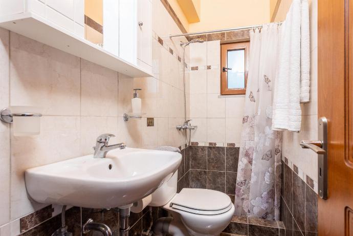 En suite bathroom with shower . - Fiscardo Villas Collection . (Photo Gallery) }}