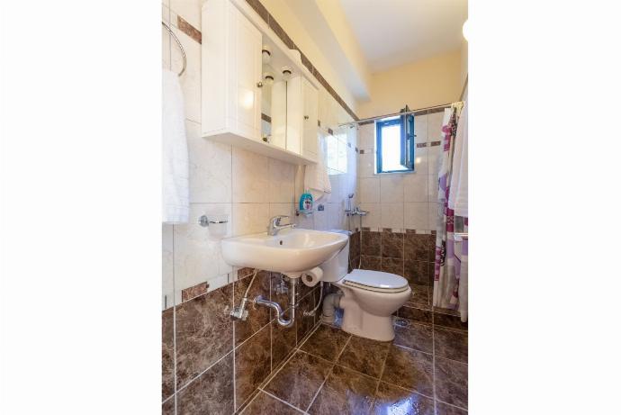 En suite bathroom with shower . - Fiscardo Villas Collection . (Photo Gallery) }}
