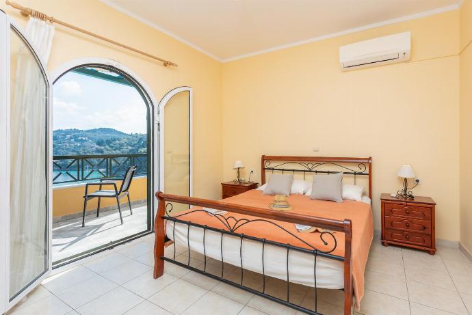 Double bedroom with A/C and sea views . - Lakka Bay View Collection . (Photo Gallery) }}