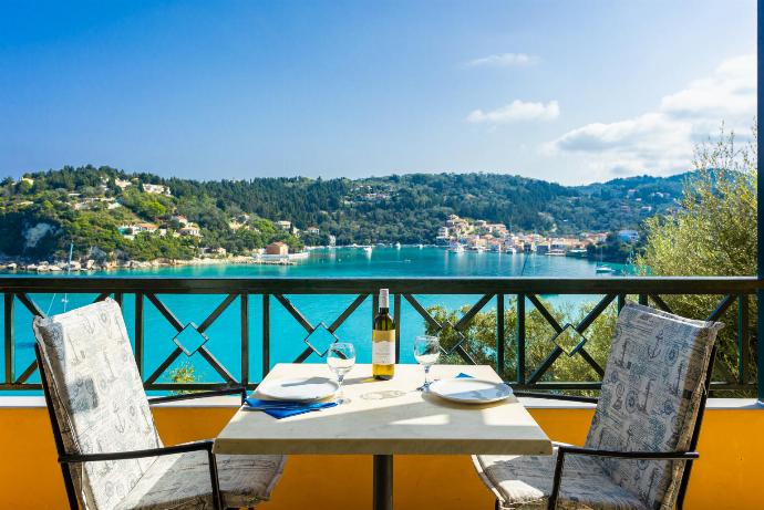 Terrace area with sea views . - Lakka Bay View Collection . (Photo Gallery) }}