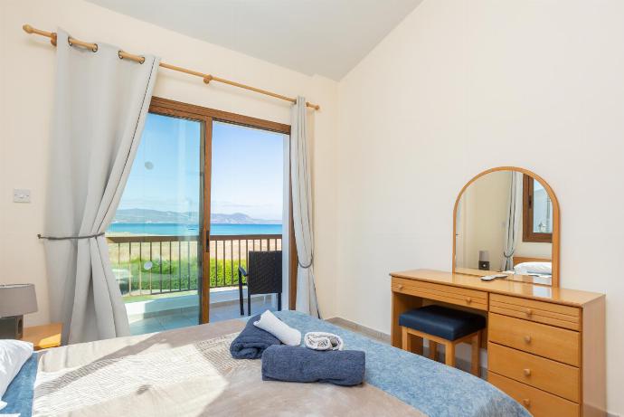 Double bedroom with A/C, sea views, and balcony access . - Blue Bay Villas Collection . (Photo Gallery) }}