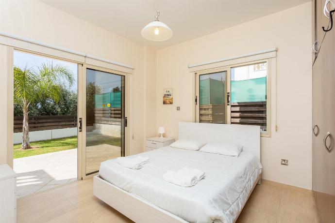 Double bedroom with A/C and terrace access . - Rose Villas Collection . (Galleria fotografica) }}