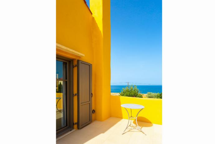 Balcony with sea views . - Panormos Villas Collection . (Photo Gallery) }}