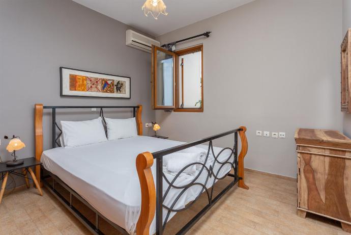Double bedroom with A/C and sea views . - Neria Villas Collection . (Photo Gallery) }}
