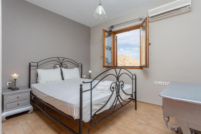 Double bedroom with A/C and sea views . - Neria Villas Collection . (Photo Gallery) }}