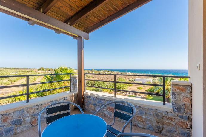 Balcony with sea views . - Spiros Villas Collection . (Photo Gallery) }}