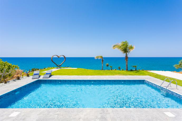 Private pool and terrace with panoramic sea views . - Villa Beach Heaven . (Photo Gallery) }}