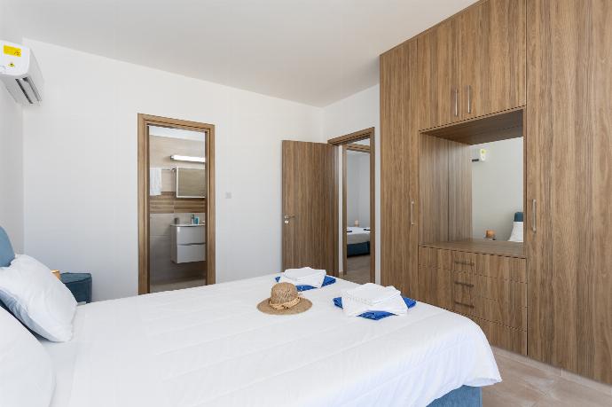Double bedroom with en suite bathroom, A/C, and sea views . - Villa Diana Seaside . (Photo Gallery) }}