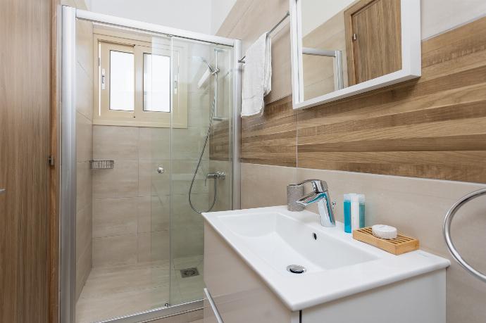 En suite bathroom with shower . - Villa Diana Seaside . (Photo Gallery) }}