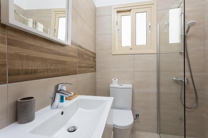 En suite bathroom with shower . - Villa Diana Seaside . (Photo Gallery) }}