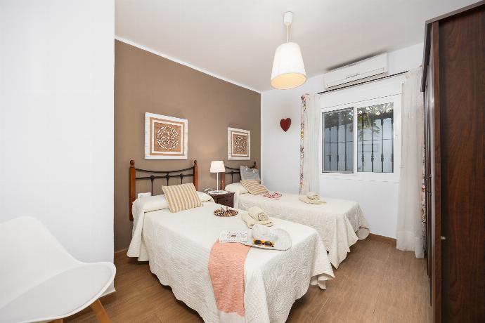 Twin bedroom with A/C . - Villa Tinao . (Photo Gallery) }}