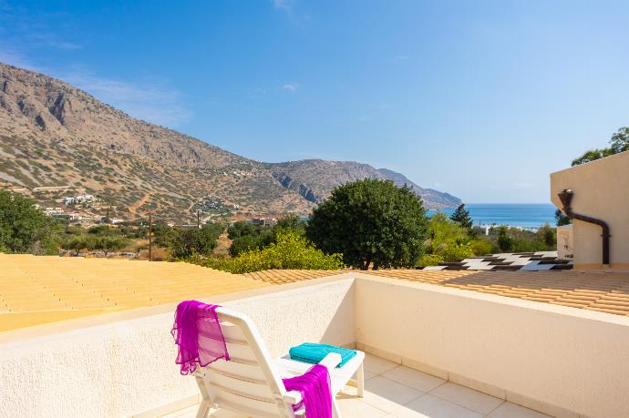 Upper terrace area with sea views . - Villa Elounda Plaka . (Photo Gallery) }}