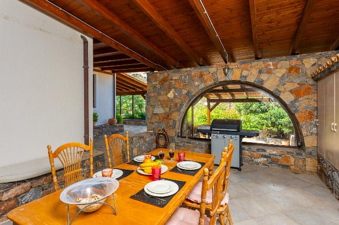 Sheltered terrace area . - Villa Elounda Blue . (Photo Gallery) }}