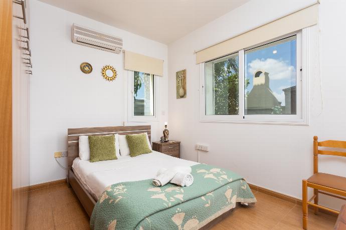 Double bedroom with A/C . - Villa Kalliopi . (Photo Gallery) }}