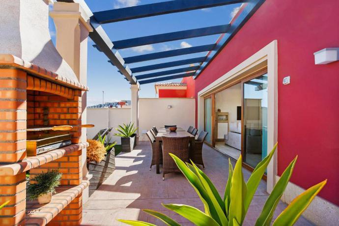 Outdoor area with BBQ . - Villa Mariposas Caleta . (Photo Gallery) }}