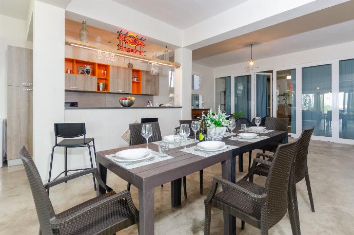 Equipped kitchen with dining area . - Villa Padima . (Photo Gallery) }}