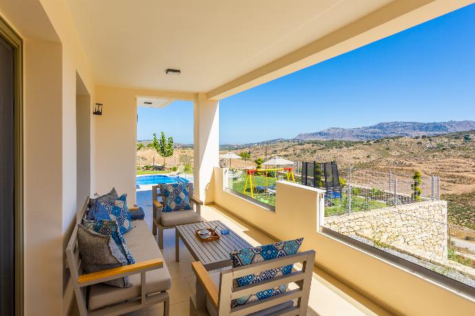 Sheltered terrace area . - Villa Marielia . (Photo Gallery) }}