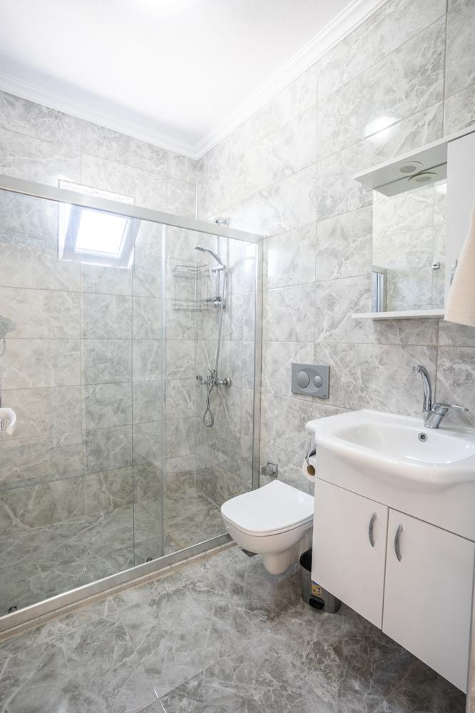 Family bathroom with shower . - Villa Bliss . (Photo Gallery) }}