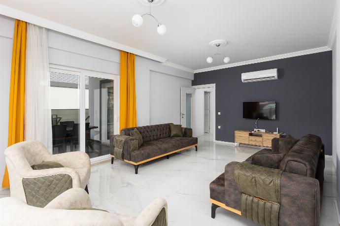 Living room with sofas, A/C, WiFi internet, and satellite TV . - Villa Sasha 1 . (Galería de imágenes) }}