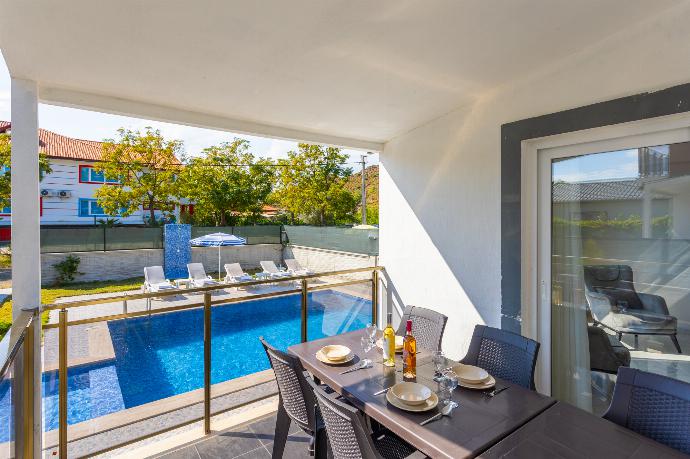 Sheltered terrace area . - Villa Sasha 2 . (Photo Gallery) }}