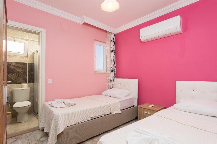 Twin bedroom with en suite bathroom and A/C . - Villa Ada 2 . (Photo Gallery) }}
