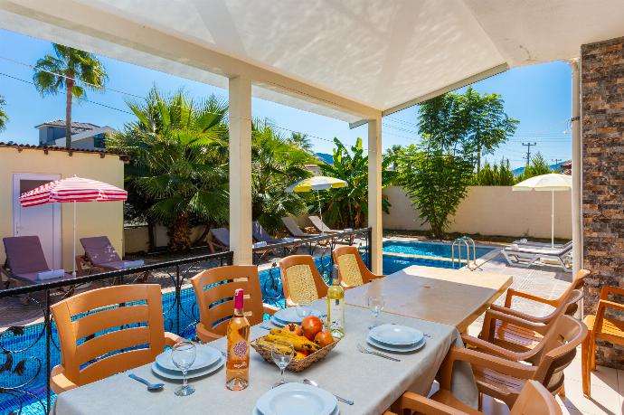 Sheltered terrace area . - Villa Kaya 1 . (Photo Gallery) }}