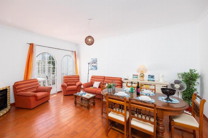 Living room with sofa, dining area, ornamental fireplace, WiFi internet, and satellite TV . - Villa Lili . (Photo Gallery) }}